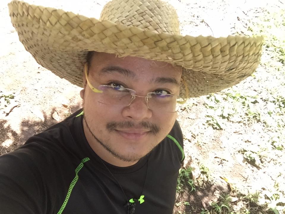 amichaelpalma wearing a farmer's hat